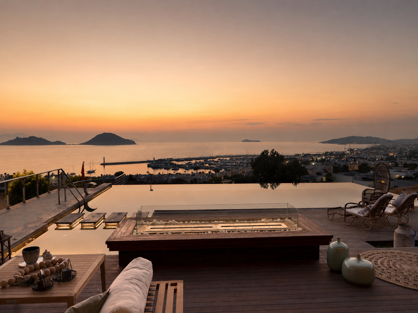 Terrace of a Mediterranean luxury villa in Bodrum at dusk, overlooking the Aegean sea